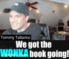 Tommy Tallarico Sitting In Front Of We Got The Wonka Book Going Sign GIF