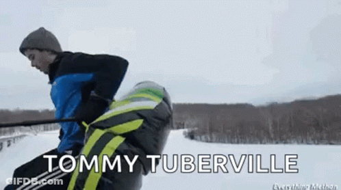 Tommy Tuberville Is Being Pulled By A Person On A Snowmobile GIF