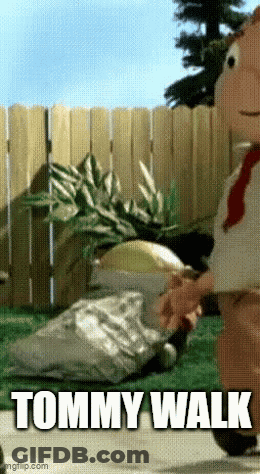 Tommy Walk Cartoon Character Walking In Yard GIF