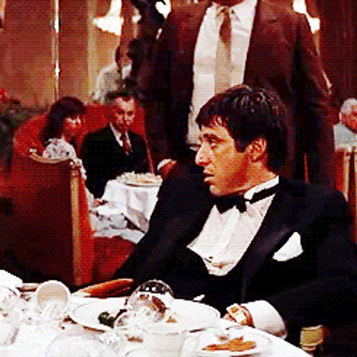 Tony Montana Bored Face GIF