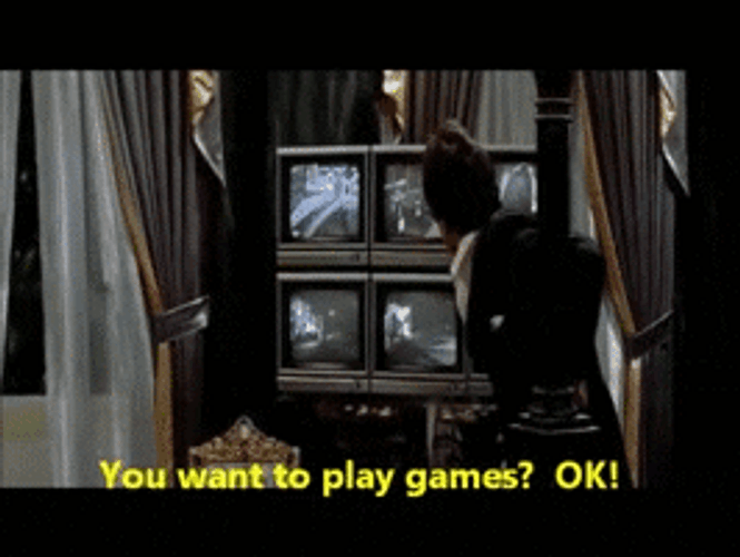 Tony Montana Play Games GIF