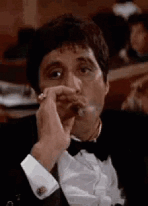 Tony Montana Smoking GIF