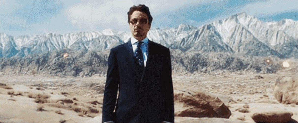 Tony Stark Cool Arms Up Explosion GIF