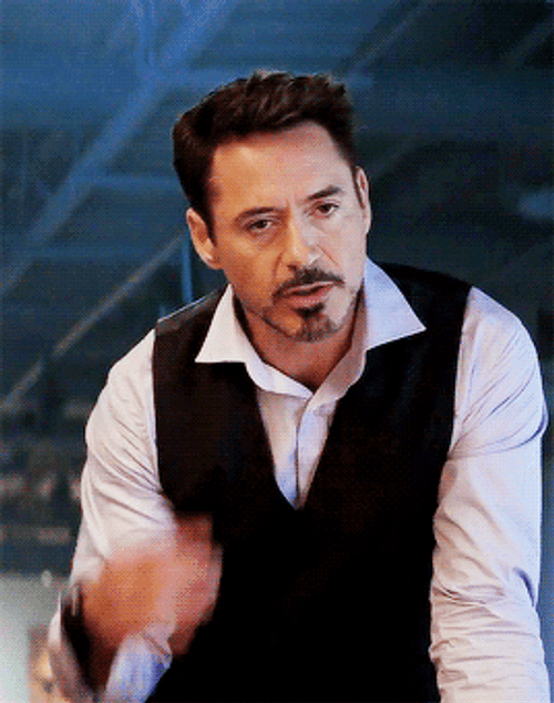 Tony Stark Sarcastic Roll Over Hand Gesture GIF