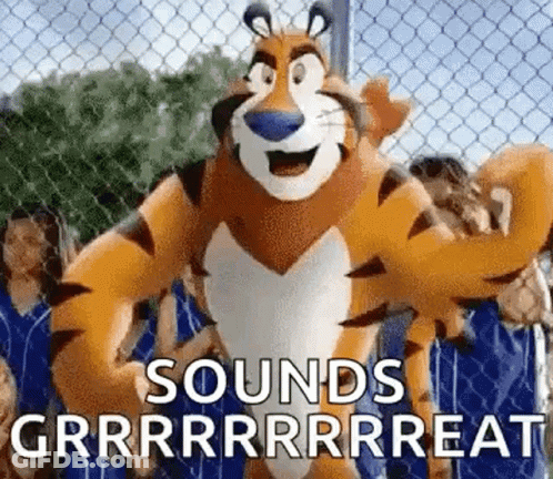 Tony The Tiger Standing In Front Of Chain Link Fence With People Behind GIF
