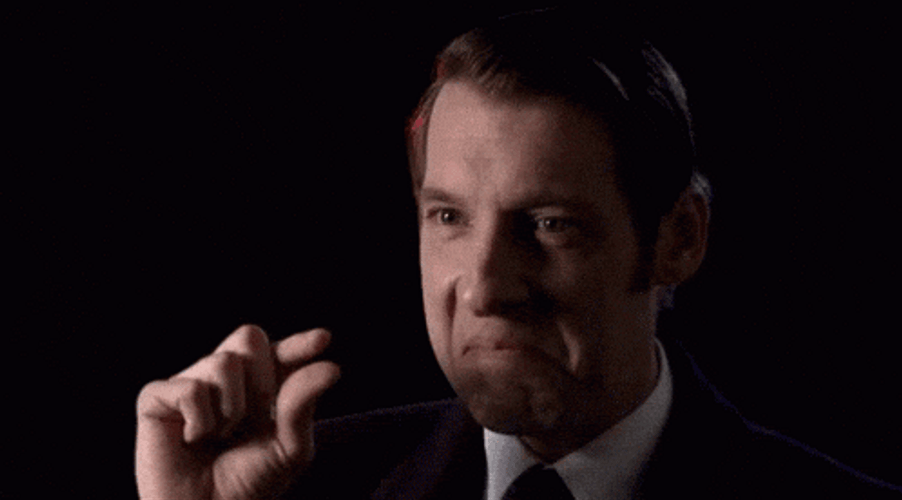 Too Small Man In Formal Black Attire GIF