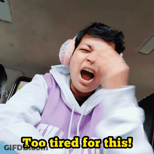 Too Tired For This Man In Ear Muffs GIF