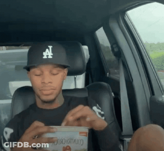 Toosii Eating Inside The Car GIF