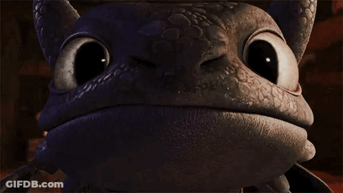 Toothless From How To Train Your Dragon Is Looking At The Camera With A Big Smile On His Face . GIF