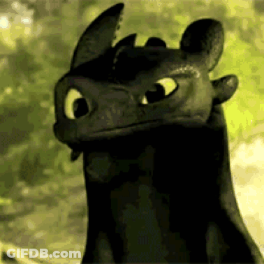 Toothless From How To Train Your Dragon Is Looking At The Camera With A Green Background . GIF