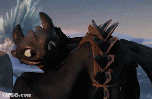Toothless From How To Train Your Dragon Is Smiling And Looking At Something GIF