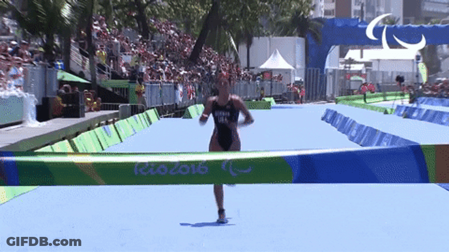 Tored Runner Finish Line Win GIF
