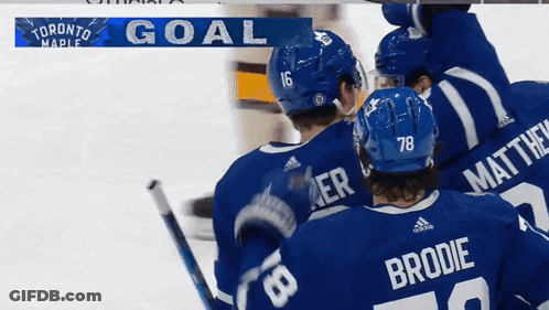 Toronto Maple Hockey Players Celebrate Goal With Banner GIF