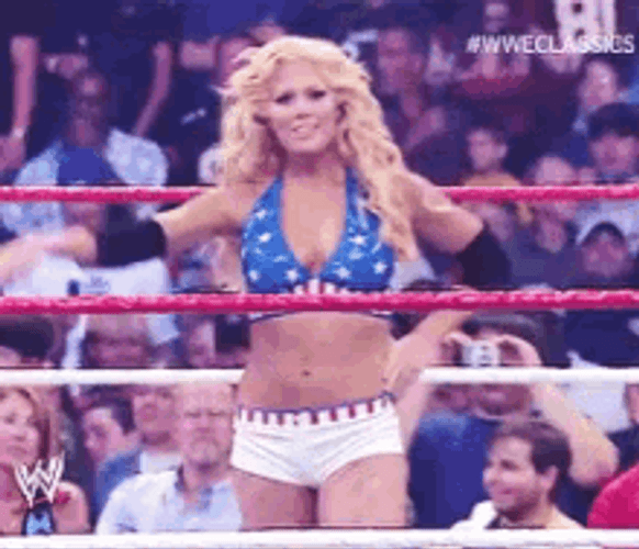 Torrie Wilson Saluting The Crowd In WWE GIF