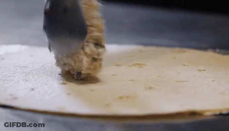 Tortilla Being Rolled With Spoon GIF