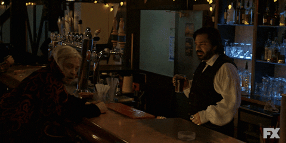 Tossing Pretending To Drink GIF