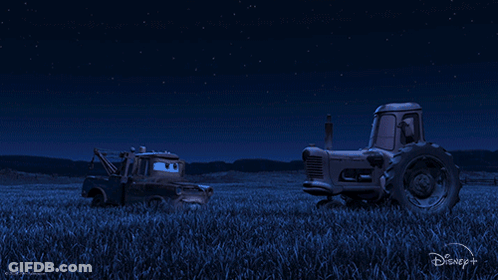 Tow Truck From Cars Sitting In Grass GIF