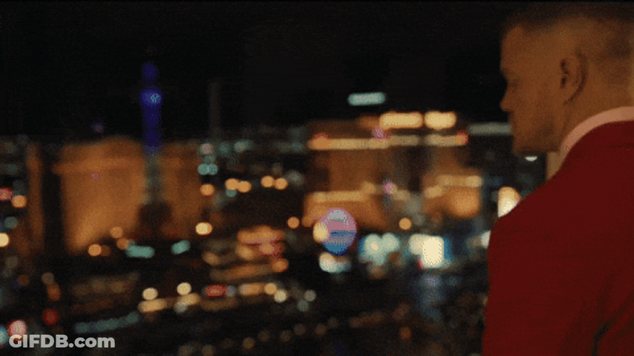 Towering Cityscape Against Skyline GIF
