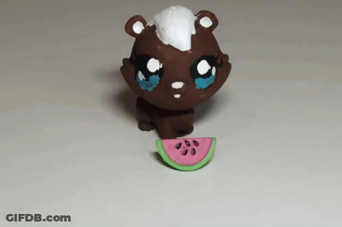 Toy Bear With Watermelon Slice In Mouth GIF