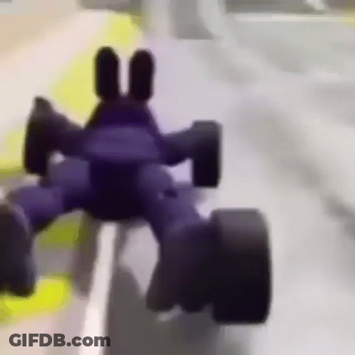 Toy Car Driving Down Road On Track GIF