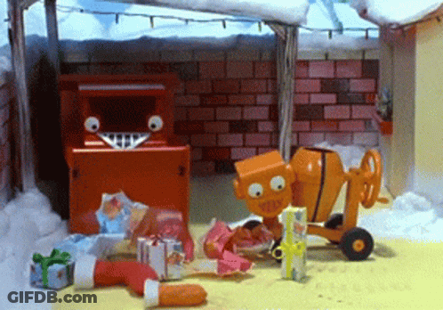 Toy Cement Mixer And Mailbox Surrounded By Presents GIF