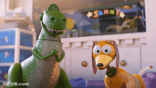 Toy Dinosaur And Toy Dog Standing By Sammy Sign GIF