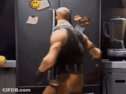 Toy Figure In Kitchen GIF