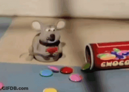 Toy Mouse Sitting In Hole Next To Can Of Choco GIF