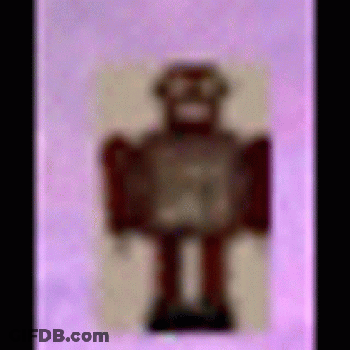 Toy Robot On Pink Background GIF