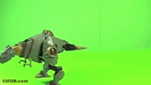 Toy Robot Walking On Green Screen GIF