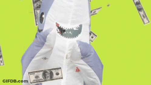 Toy Shark Surrounded By Falling Money GIF