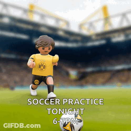 Toy Soccer Player In Yellow BVB Jersey Kicking Ball GIF