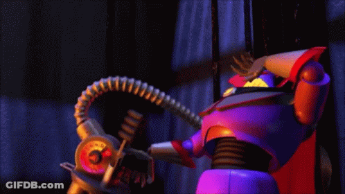 Toy Story Character Holding Large Gun GIF