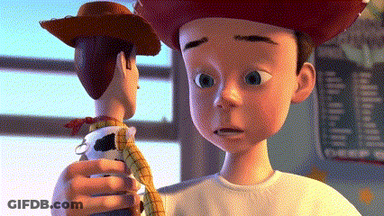 Toy Story Character Holding Woody Doll GIF