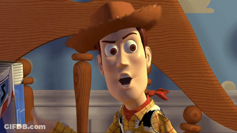 Toy Story Characters Buzz Lightyear And Woody Are Standing In A Room GIF