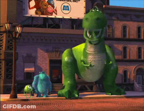 Toy Story Characters In Front Of Monsters Inc. Sign GIF