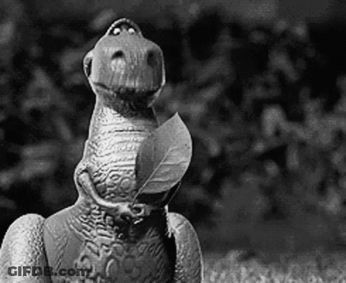 Toy Story Dinosaur With Leaf In Mouth GIF