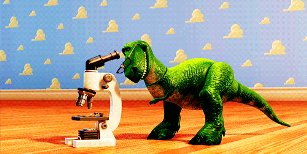 Toy Story Rex Looking On A Microscope GIF