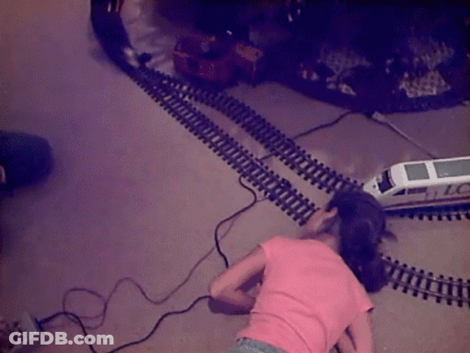 Toy Train Crash Bumped On Girl's Face GIF