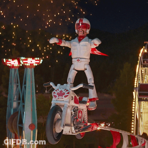 Toy With Canadian Flag On Motorcycle GIF