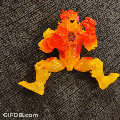 Toy With Orange And Yellow Arms And Legs On Couch GIF