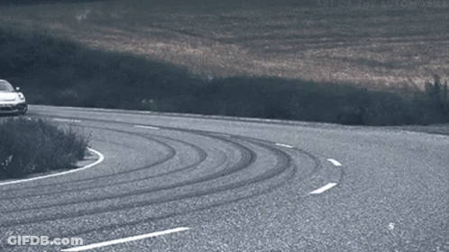 Toyota Car Driving Down Road GIF