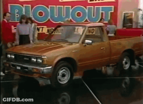 Toyota Truck In Front Of Blowout Sign GIF