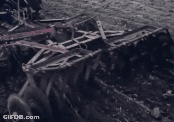 Tractor Plowing The Field GIF
