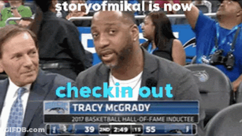 Tracy McGrady Sitting In Stands Watching Basketball GIF