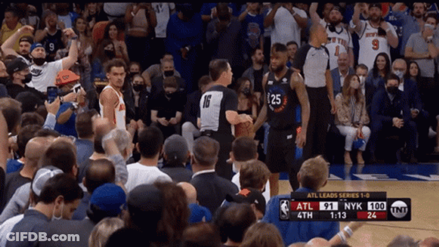 Trae Young Smiling At Crowd GIF