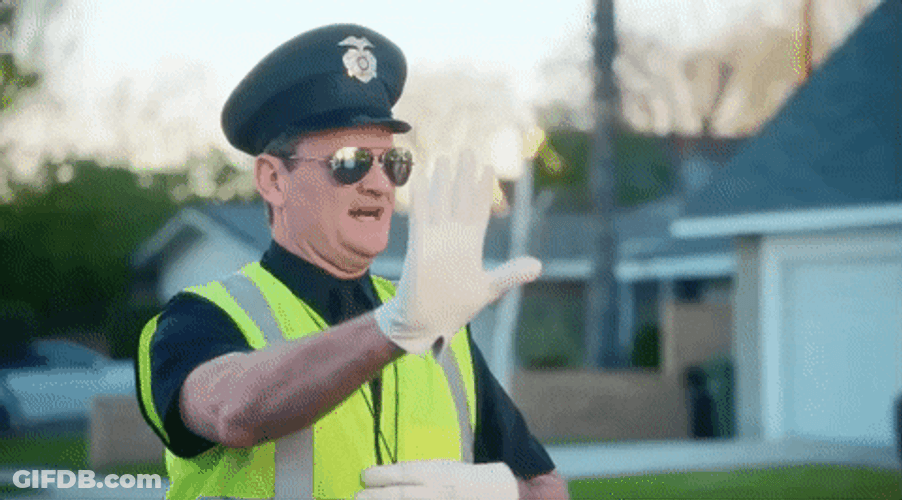 Traffic Cop Brett Eldredge Directing Traffic GIF