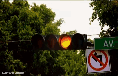 Traffic Light With Green Sign Saying Av GIF