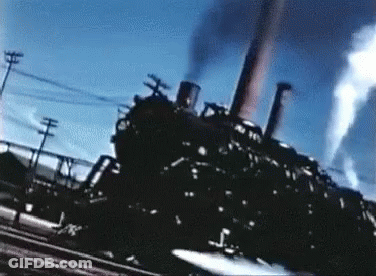 Train Going Down Tracks With Smoke GIF