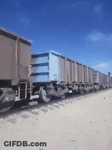 Train On Tracks With Blue Box GIF